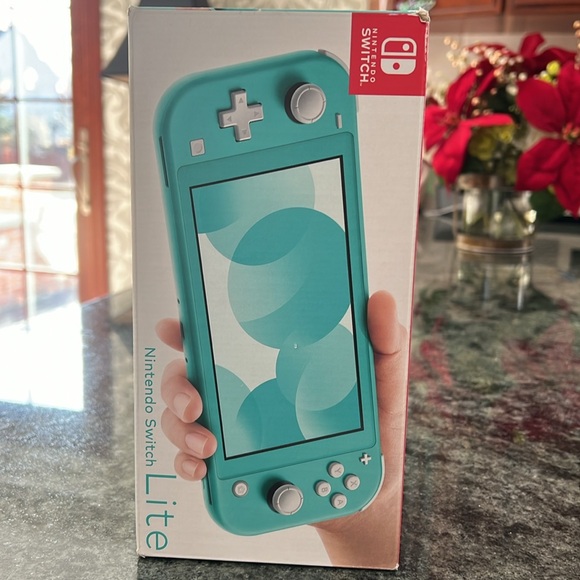 Nintendo Switch Lite in Turquoise - Picture 2 of 4
